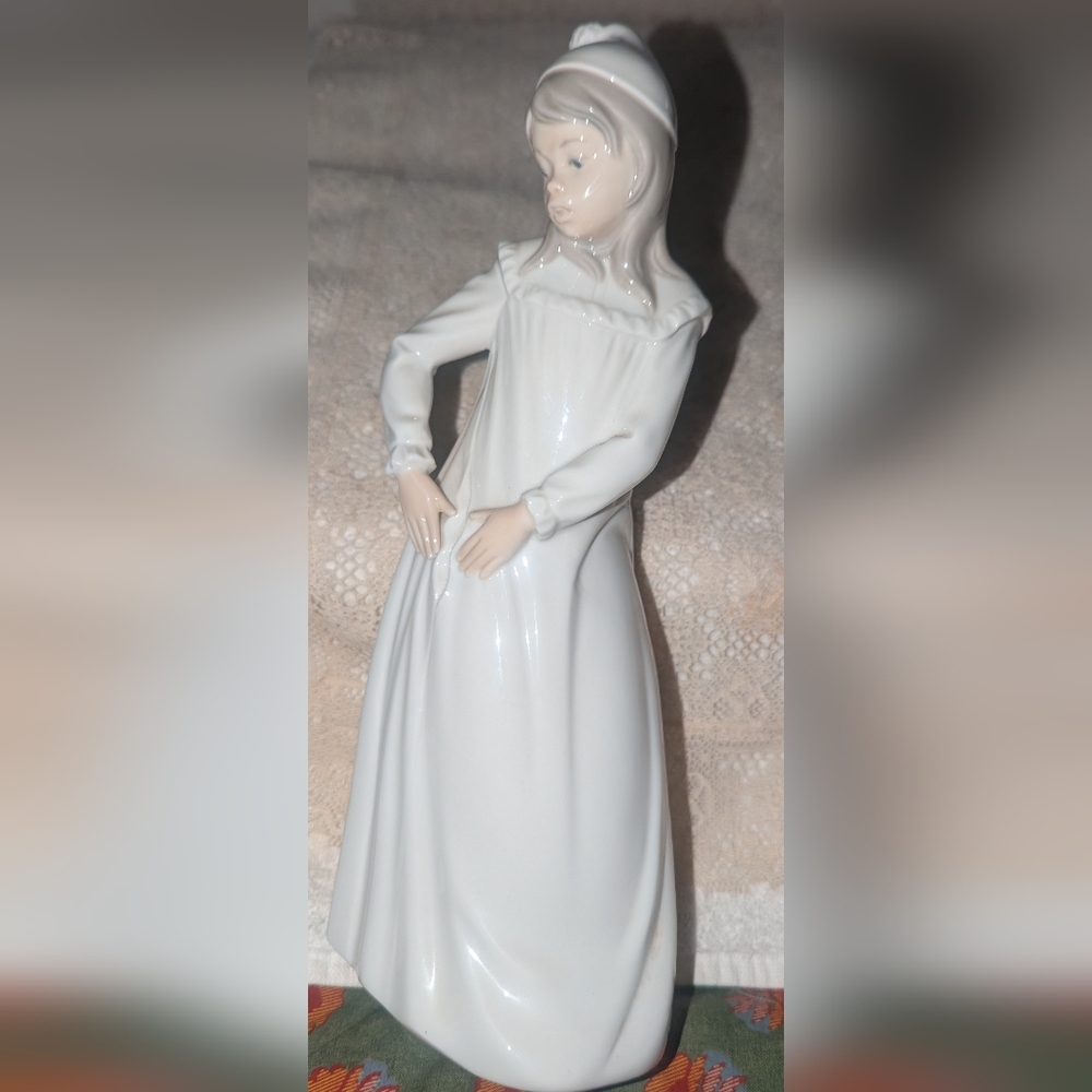 Nao Llardo Daisa Girl With Torn Nightgown Figurine.